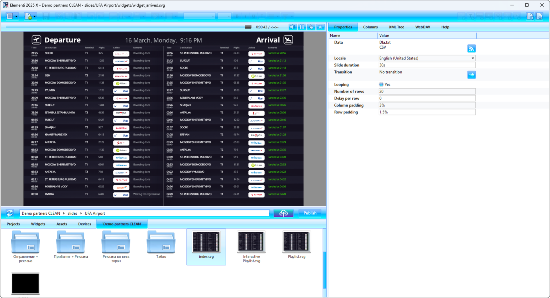 Modern Dubai venue lobby with digital screens displaying bilingual Arabic and English emergency evacuation content and real-time occupancy counters powered by SpinetiX