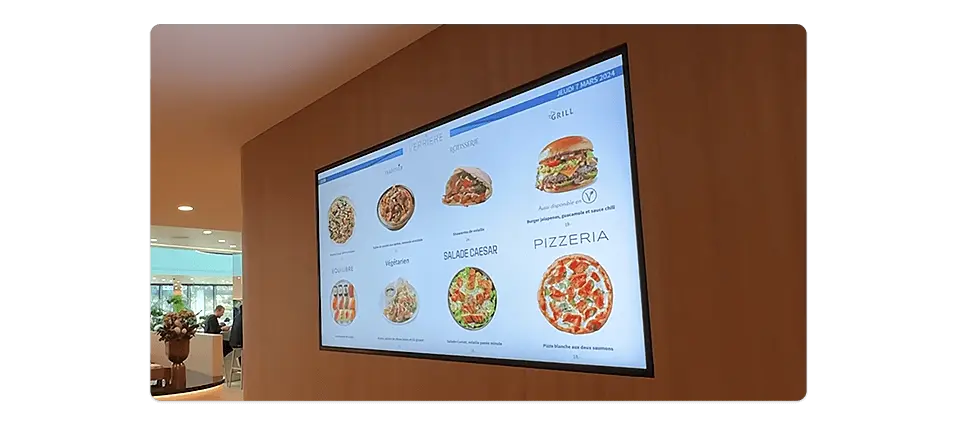 Synchronized digital menu boards in café