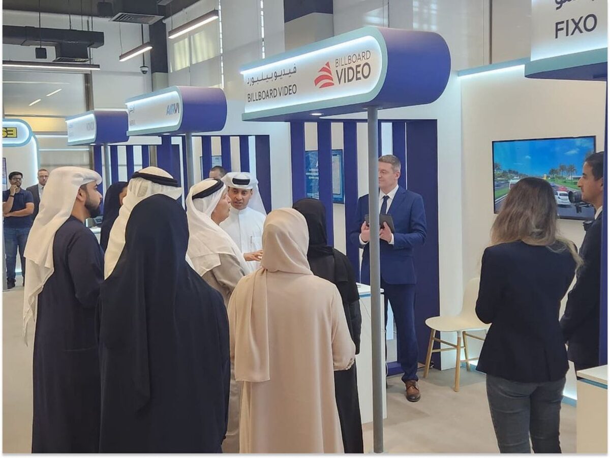 Stage at the Dubai RTA Startups Challenge event with SpinetiX-powered backdrop screens displaying participant presentations and award announcements