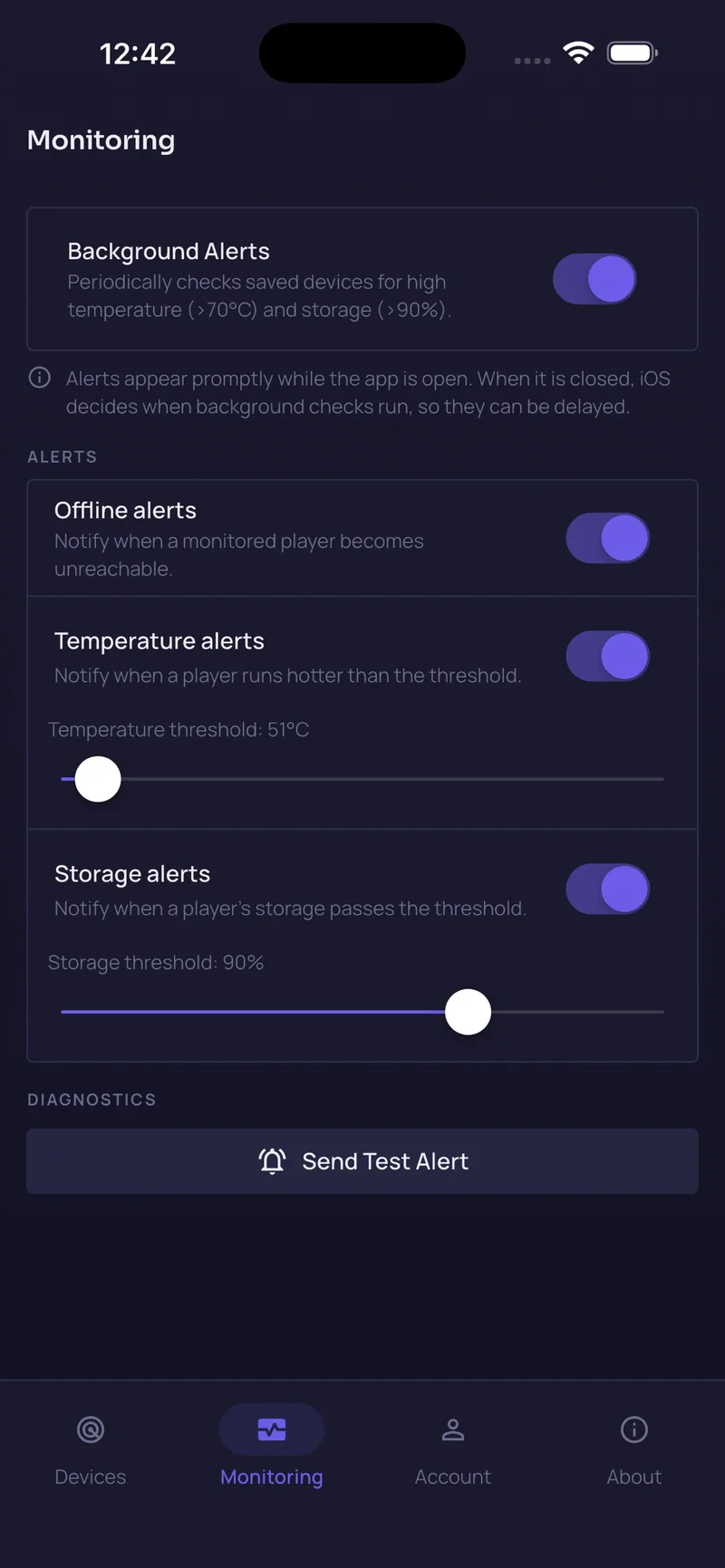 SpinetiX Find & Monitor on iPhone: the Monitoring tab with switches for offline, temperature and storage alerts and sliders setting the thresholds