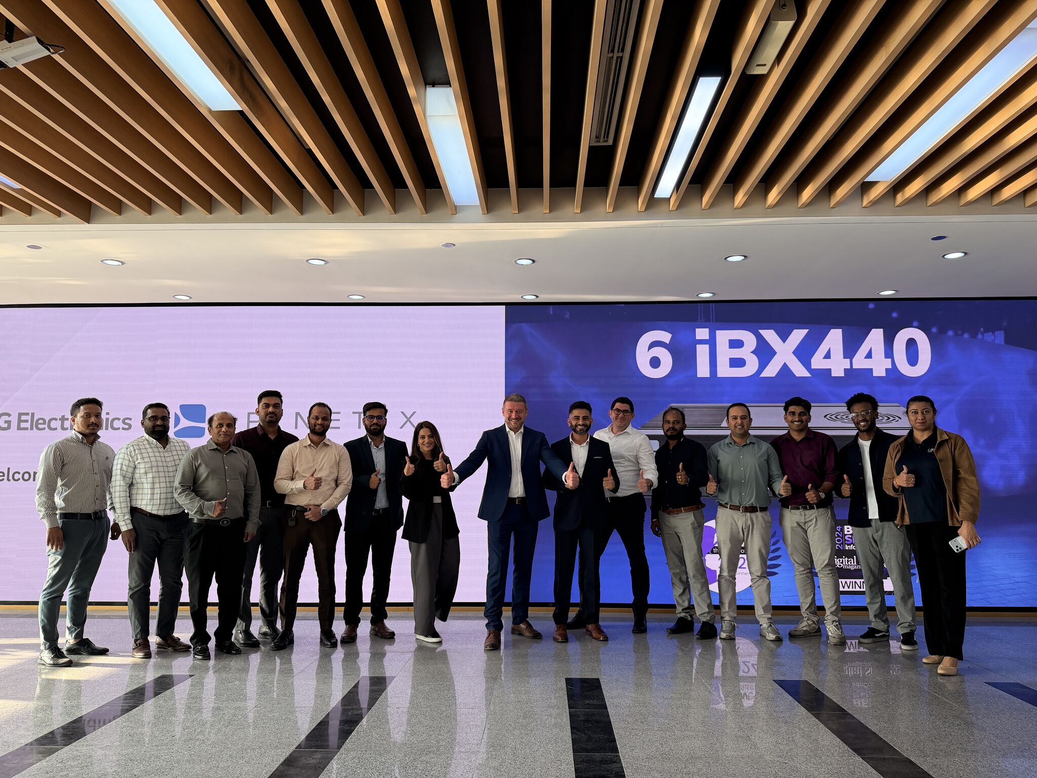 SpinetiX live partner onboarding training session — team of AV integrators and digital signage professionals at LG Electronics and SpinetiX event in Dubai